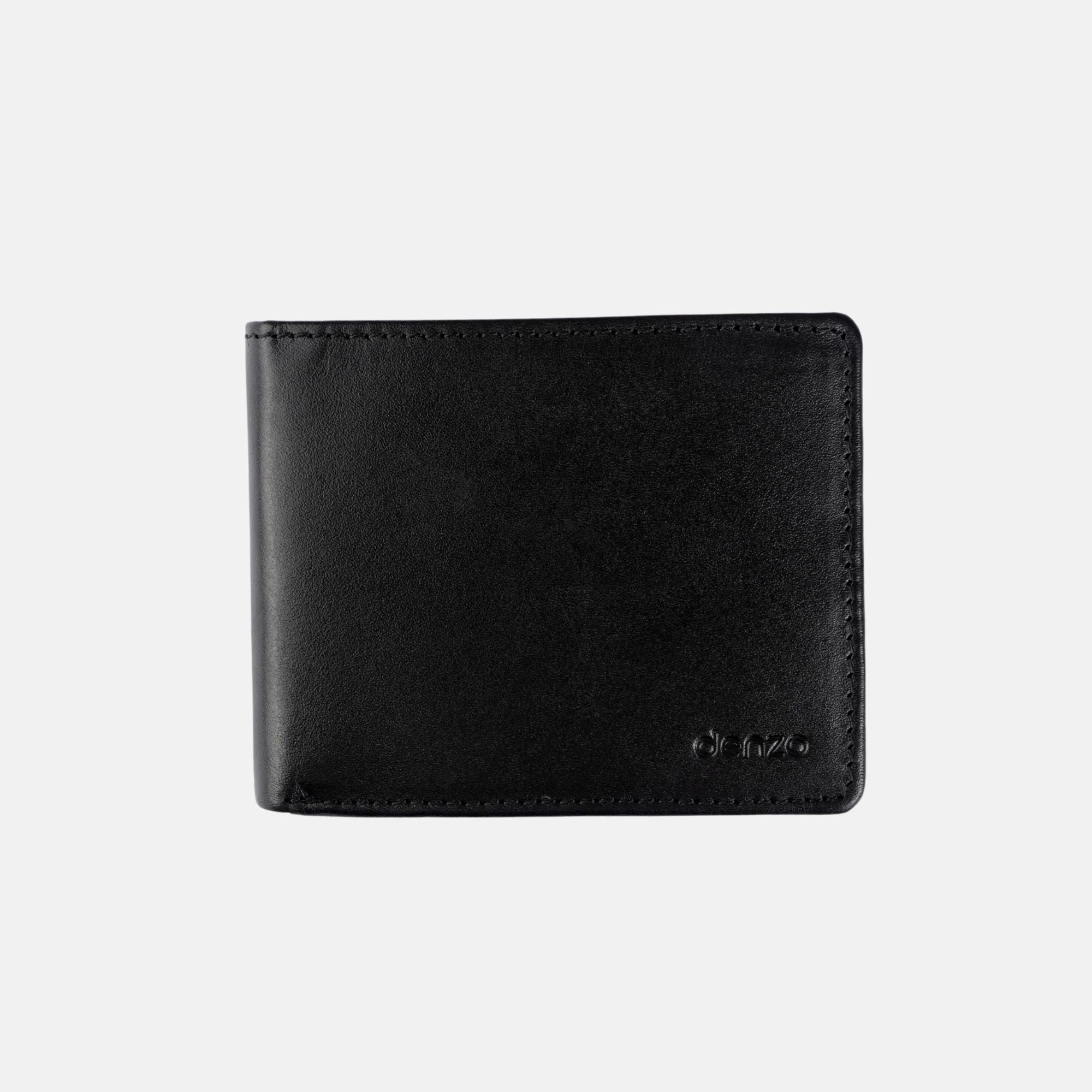 The Denzo Fashion Vintage Legacy Wallet, a testament to expert craftsmanship, sits on a plain light gray background. This closed black leather wallet boasts minimal stitching and a subtle embossed logo in the bottom right corner, epitomizing timeless design.